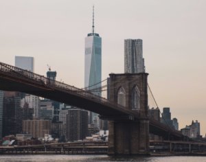 A picture of the brooklyn bridge looking into downtown New York City
