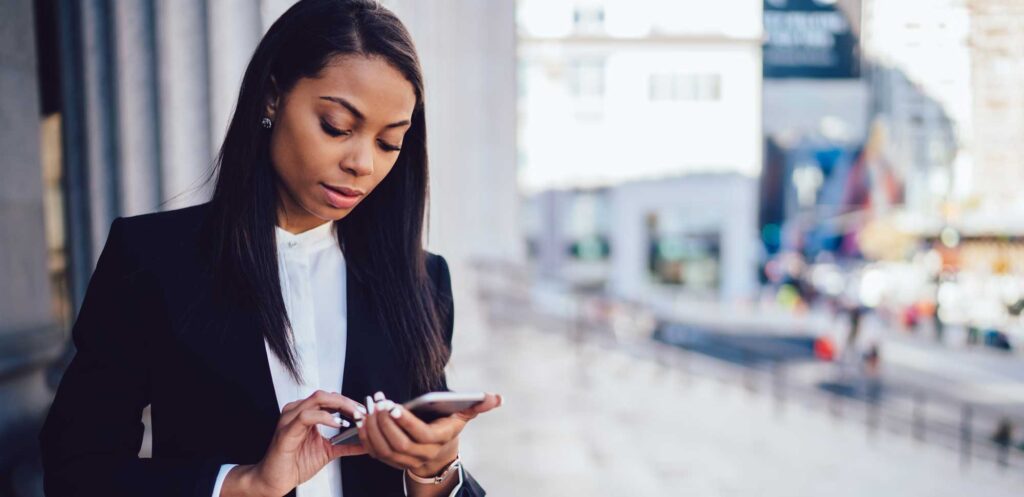 woman holding a smart phone